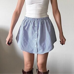 Blue and white pinstripe mini skirt with buttons